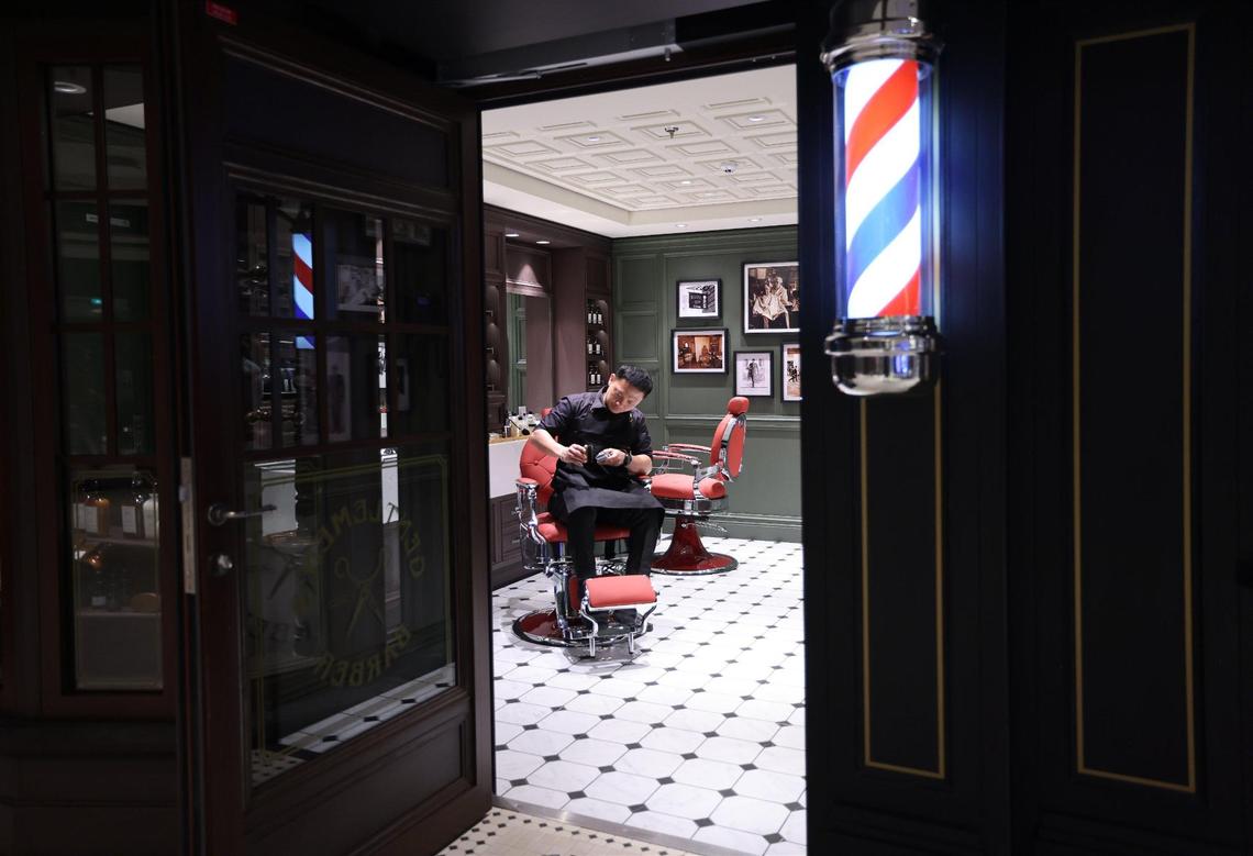Barber Emmar Seno of the Philippines cleans his sheer inside the Gentlemen’s Barber as MSC Cruises officially named its highly-anticipated new flagship, MSC World America, at the line’s new state-of-the-art MSC Miami Cruise Terminal on Wednesday, April 9, 2025, at PortMiami.