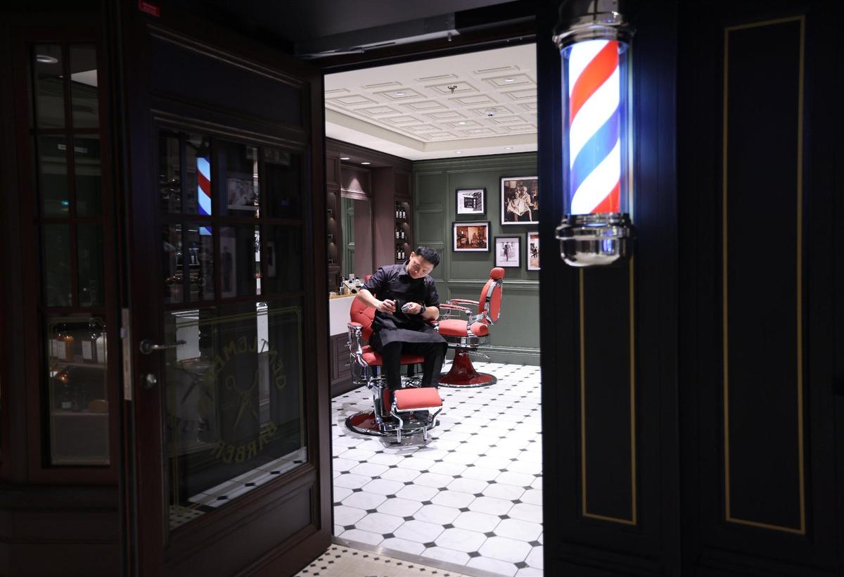 Barber Emmar Seno of the Philippines cleans his sheer inside the Gentlemen’s Barber as MSC Cruises officially named its highly-anticipated new flagship, MSC World America, at the line’s new state-of-the-art MSC Miami Cruise Terminal on Wednesday, April 9, 2025, at PortMiami.