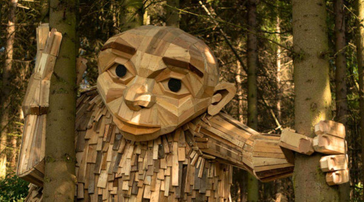 Thomas Dambo’s trolls are made of natural repurposed materials and they blend in with nature.