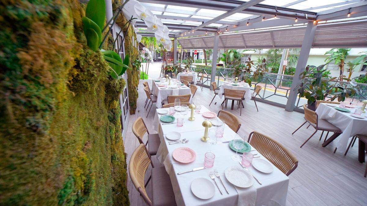 The covered patio at Amalia at The Lennox Hotel in Miami Beach.