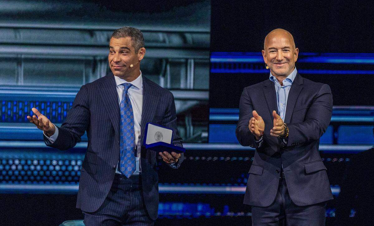 Jeff Bezos, Founder of Amazon and Blue Origin, reacts after receiving the City of Miami's key from Mayor Francis Suarez, during day two of the America Business Forum, at the Kaseya Center in Miami, on Thursday November 06, 2025.