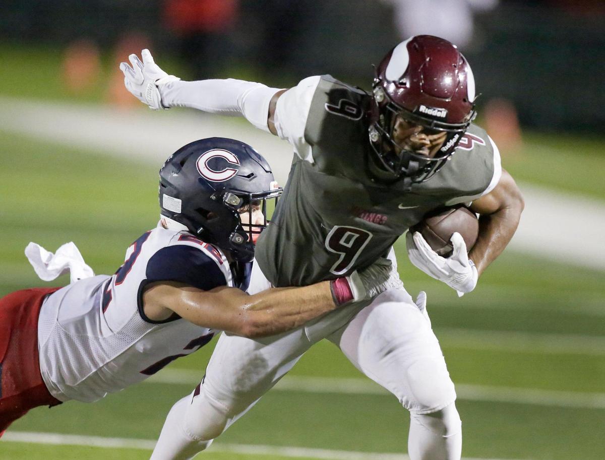 Norland Vikings wide receiver Isaiah Scott (9) tries to break free from Columbus Explorers defender during the football game on Friday, October 20, 2023 at Traz Povewll Stadium in Miami. Andrew Uloza / for Miami Herald