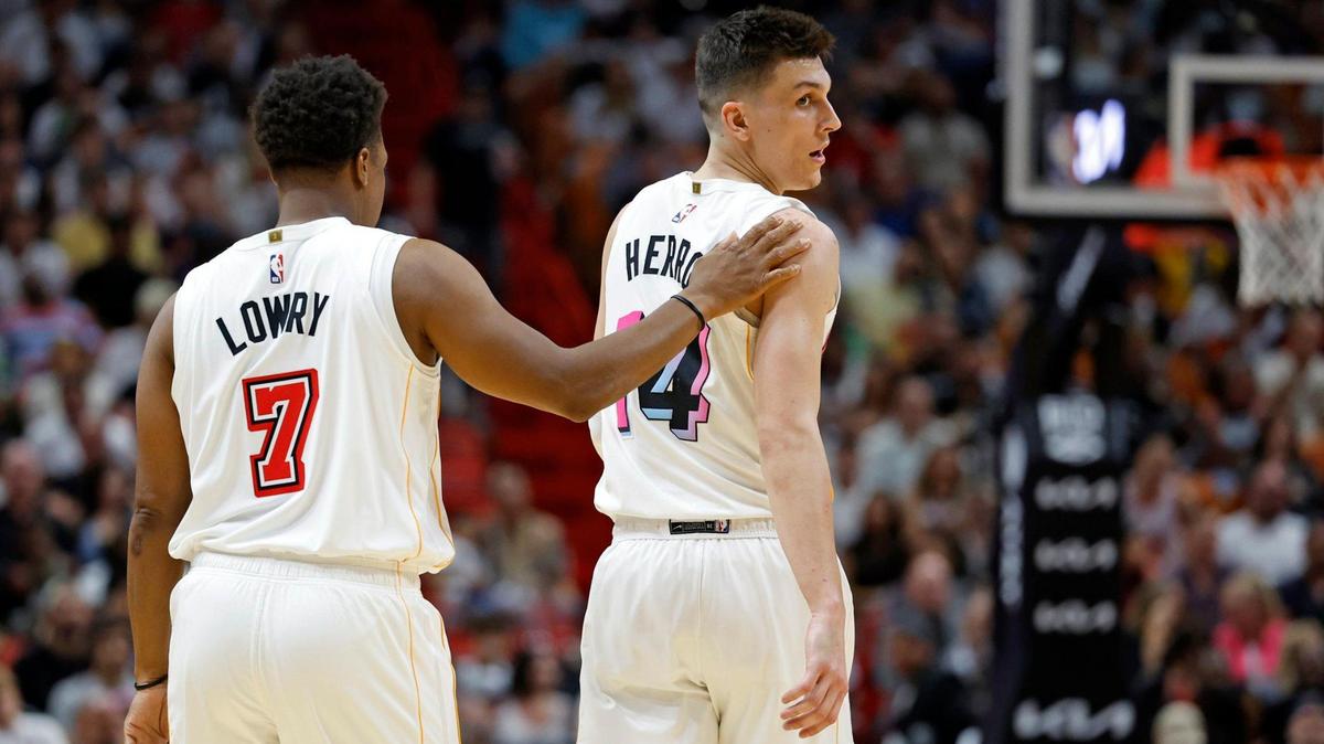 Miami Heat guard Kyle Lowry (7) and guard Tyler Herro (14) walk on the court during the game against the Brooklyn Nets in the first half at Miami-Dade Arena in Miami, Fl. on Saturday, March 25, 2023.