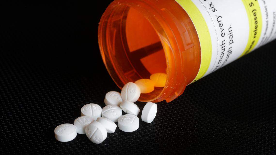 In this photo, oxycodone pills are displayed on Aug. 29, 2018, in New York. On March 25, 2022, a Boston man pleaded guilty after he was found with 200 fentanyl pills disguised as the prescription painkiller oxycodone in Massachusetts, officials say.