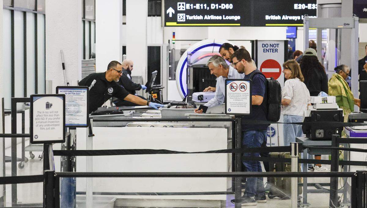 Travelers navigate short TSA lines at Miami International Airport on Monday morning, March 23, 2026. The ongoing partial federal government shutdown has affected many airports around the United States, including Miami and Fort Lauderdale airports.