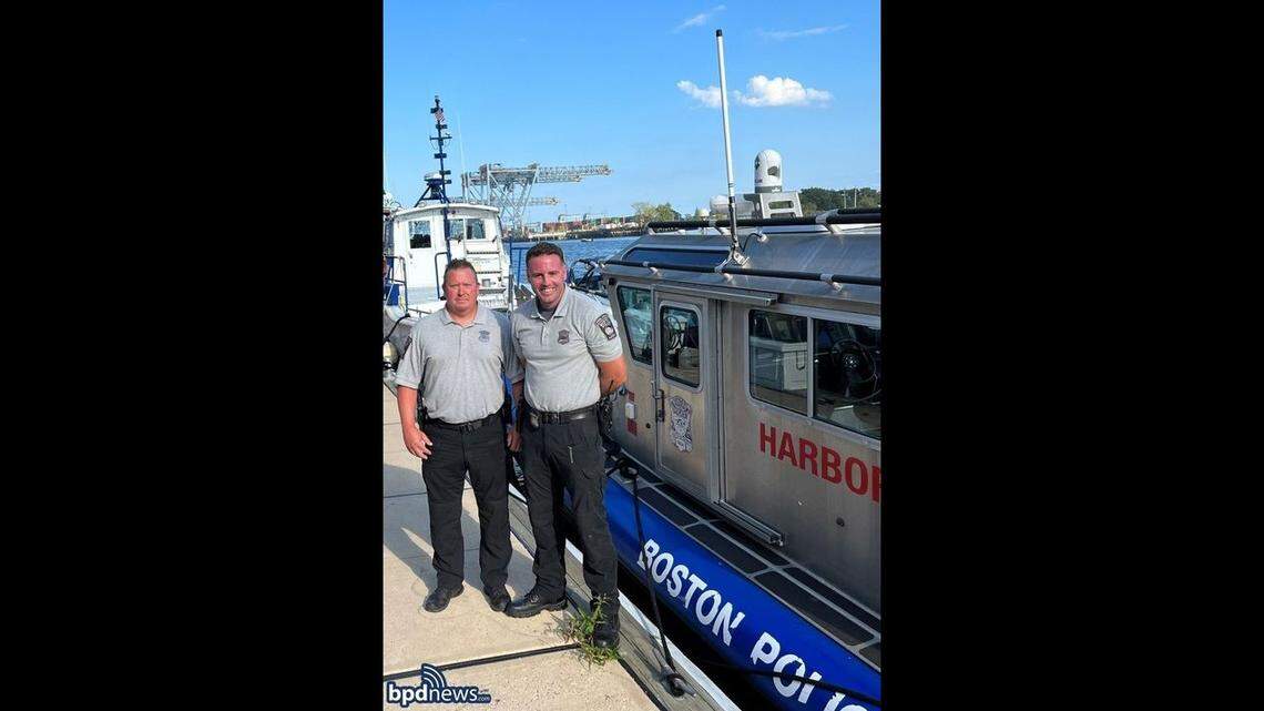 Two Boston Police Department officers, pictured above, rescued two men from the Boston Harbor on Aug. 24 after their boat sank.