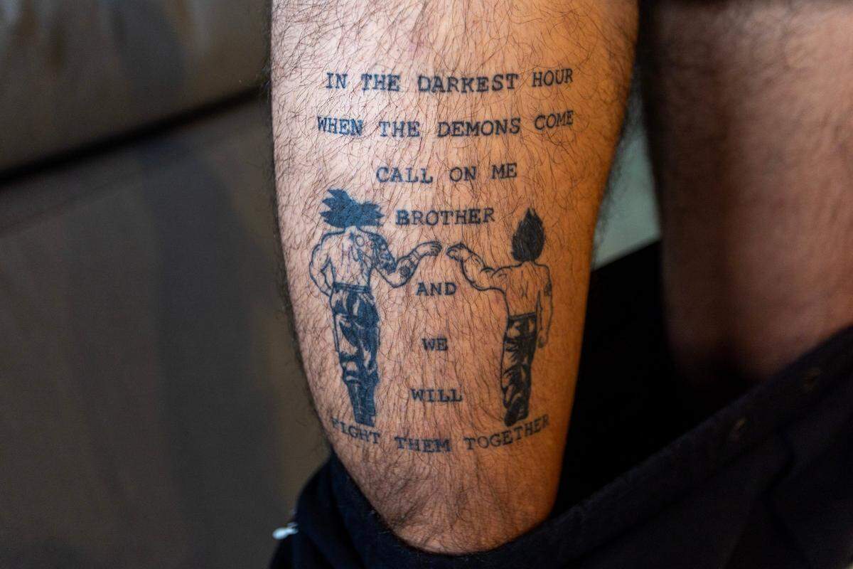 Roi Joseph Benaim, 26, shows a tattoo he got to commemorate the Oct. 7 terrorist attack. Benaim was with his brother and friends when Hamas terrorists attacked an Israeli music festival near the Gaza Strip.