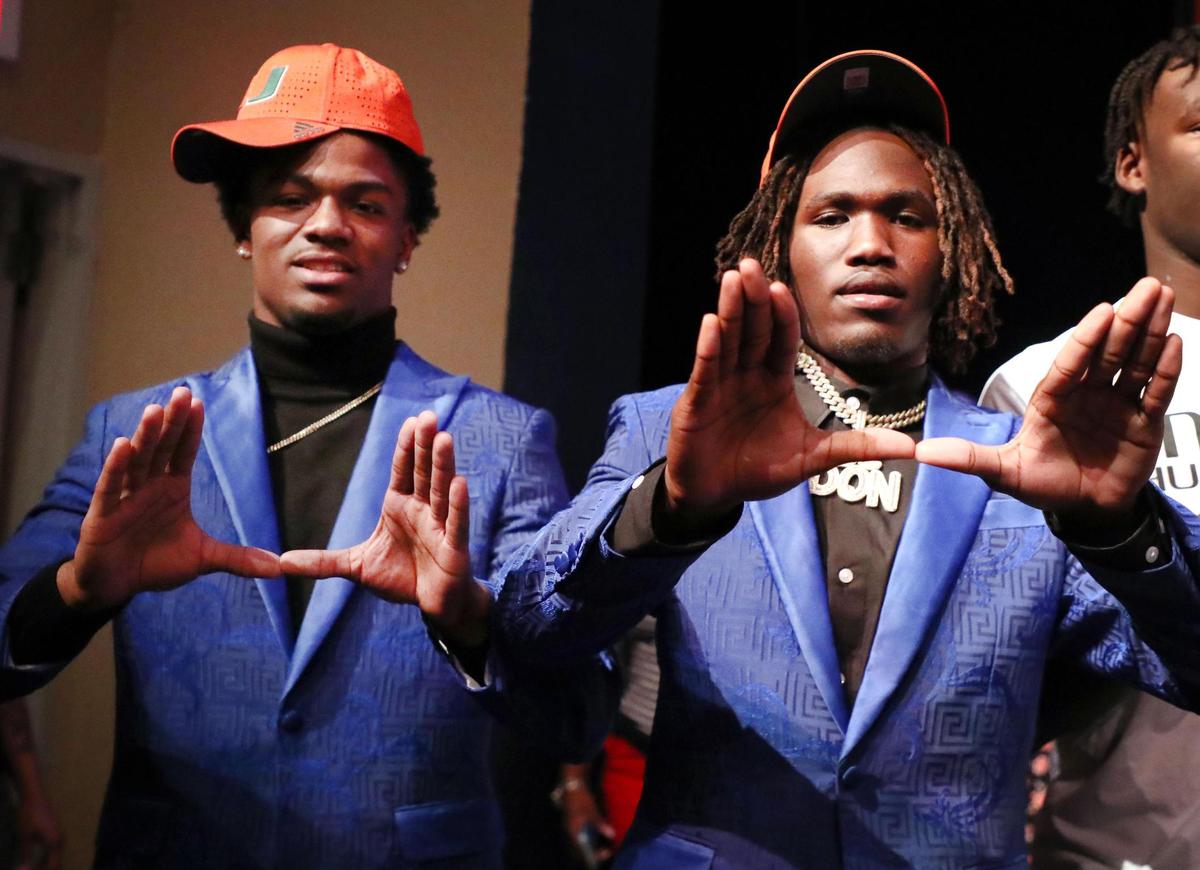 Dillard’s safety Antione Jackson and running back Christopher Johnson, both commit to going to the University of Miami on the first day of the Early Signing Period Dillard High School in Fort Lauderdale on Wednesday, December 21, 2022.