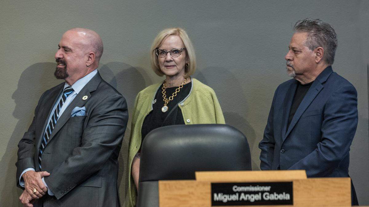 From left- City of Miami Commissioners Damian Pardo (right) and Miguel Gabela flanked Mayor Eileen Higgins, during a presentation ahead of a Miami City Commission meeting, at City Hall, on Thursday May 28, 2026.