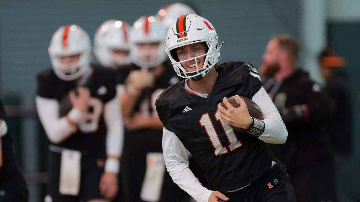 Miami Hurricanes quarterback Carson Beck (11) works out during spring practice at the Carol Soffer Indoor Practice Facility at the University of Miami in Coral Gables, Florida, Monday, March 3, 2025.