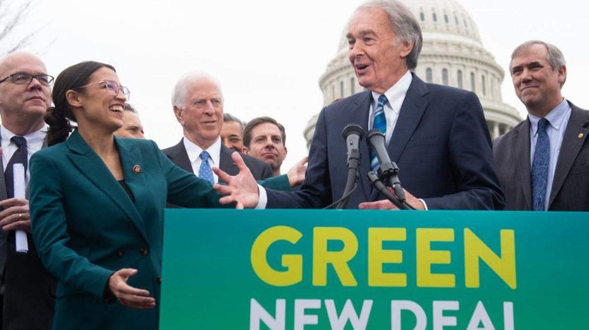 U.S. Rep. Alexandria Ocasio-Cortez and Sen. Ed Markey, both Democrats, at a press conference to announce Green New Deal legislation.