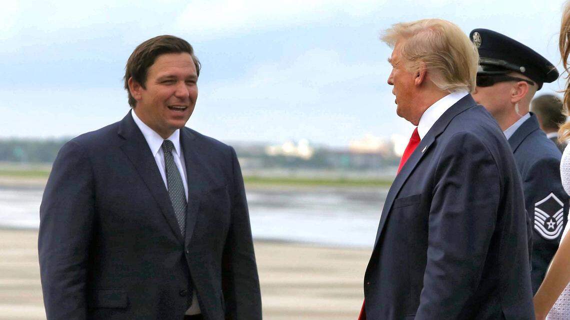 Florida Gov. Ron DeSantis, left, traveled to Orlando International Airport in June 2019 to greet President Donald Trump as he arrived for his 2020 campaign kickoff rally.