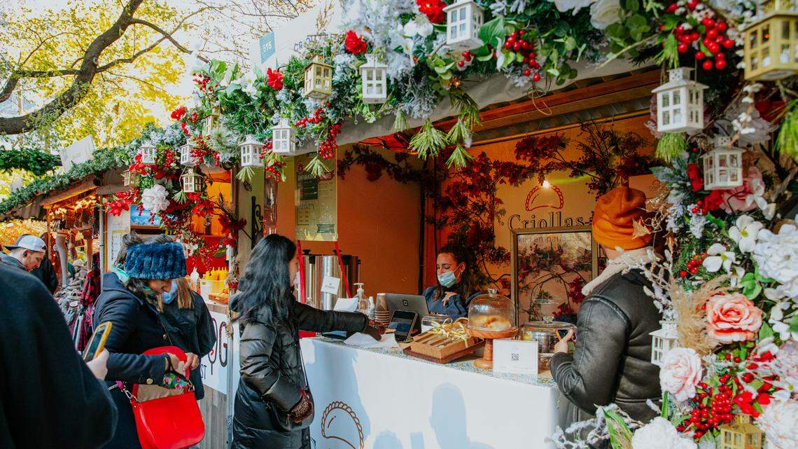 Shoppers check out a vendor at one of the Urbanspace markets in Columbus Circle, New York.