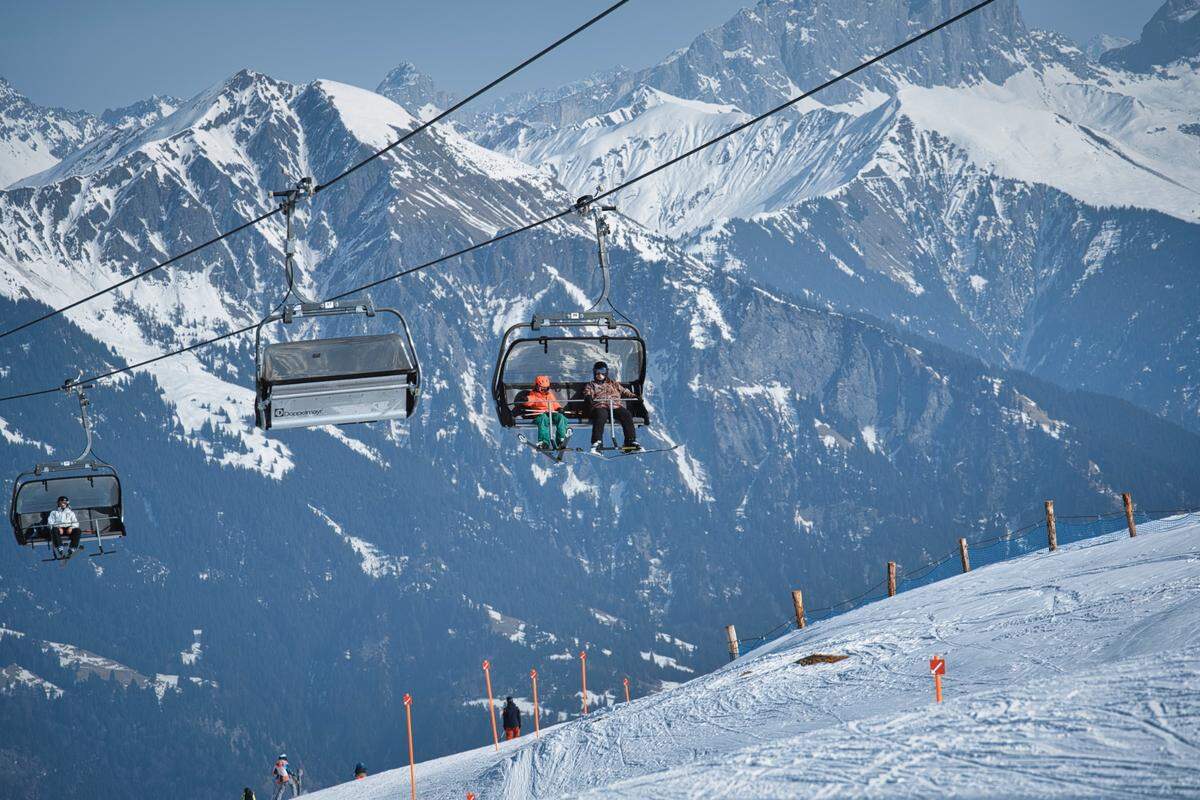 Ski lifts going up the mountain in Pizol, Switzerland.
