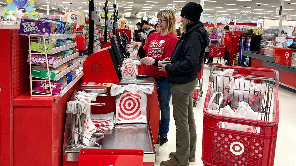 Target is testing changes to its self-checkout lanes, limiting customers to 10 items at select stores in undisclosed locations, reports say. (AP Photo/Nam Y. Huh)