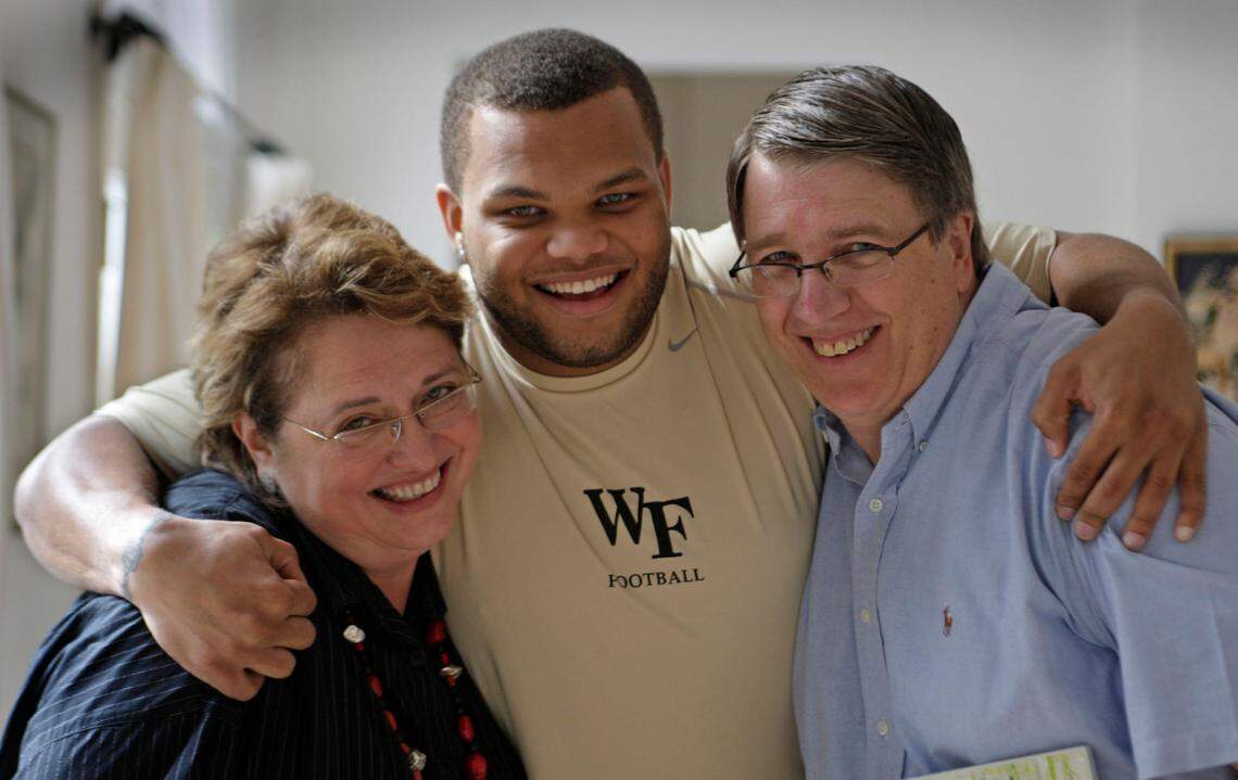 3-12-08 AL DIAZ / MIAMI HERALD - In this 2008 Miami Herald file photo, Margaret Pericak-Vance, Ph.D., left, and her husband, Dr. Jeffrey Vance, far right, with Richard Belton, center, whom they became the legal guardians when he was a teen. The Vances lead the John P. Hussman Institute for Human Genomics at the of Miami’s Miller School of Medicine.. She is leading an international study with UM and other institutions, including the University of Ibadan in Nigeria, that will ​recruit ​up to 13,000 people of African and Hispanic ancestry to study Alzeheimer’s disease.
