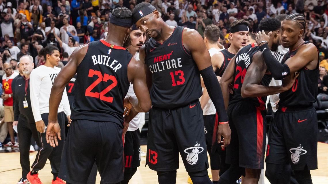 Miami Heat forward Jimmy Butler (22) and center Bam Adebayo (13) celebrate after defeating the Los Angeles Lakers in their NBA game at the Kaseya Center on Monday, Nov. 6, 2023, in downtown Miami, Fla.