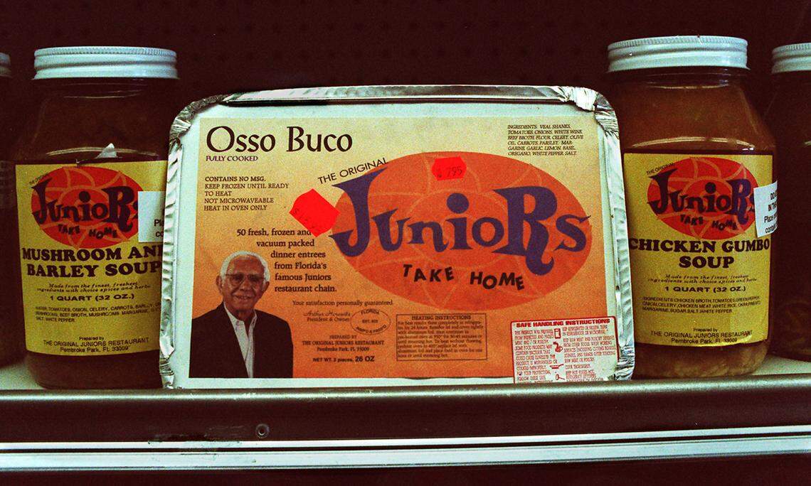 Junior’s is back with take home dishes that are refrigerated and frozen. Arthur Horowitz appears on the cover of Osso Buco, one of the more popular frozen dishes. The soups are refrigerated, and all are prepared in Pembroke Park, flash frozen and trucked to the retail shop on 20475 Biscayne Blvd., North Dade. Mr. Horowitz taste tests samples of the food every day, and they plan on opening seven more retail stores in the future.
