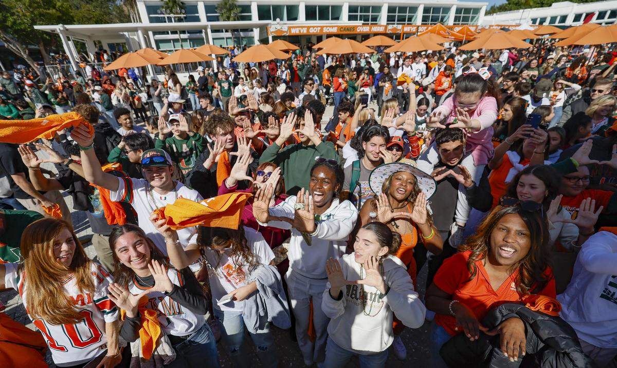 Canes fans get excited at the campus pep rally on Friday.