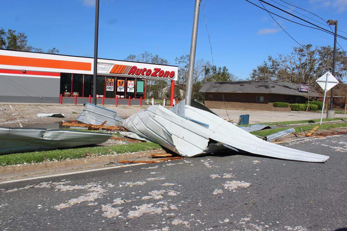 Metal siding blown from a building during Hurricane Michael lays in the street in Calhoun County. The county, about 30 miles north of Mexico Beach, suffered severe destruction in the wake of the storm.