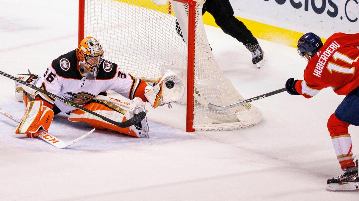Florida Panthers left wing Jonathan Huberdeau (11) scores the winning goal against Anaheim Ducks goaltender John Gibson (36) during the overtime of an NHL game at the FLA Live Arena on Tuesday, April 12, 2022 in Sunrise, Fl.