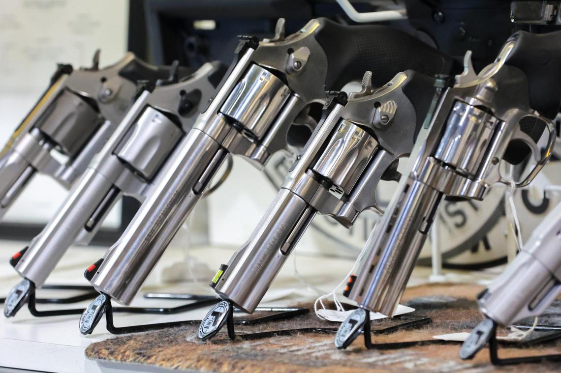 Firearms are displayed during a press conference at Top Gun Indoor Range at 12015 SW. 114 Pl. in Kendall on Friday, July 18, 2025. The Bureau of Alcohol, Tobacco, Firearms and Explosives announced a campaign to bring awareness about the consequences of illegally purchasing a firearm for another individual who cannot purchase a firearm.