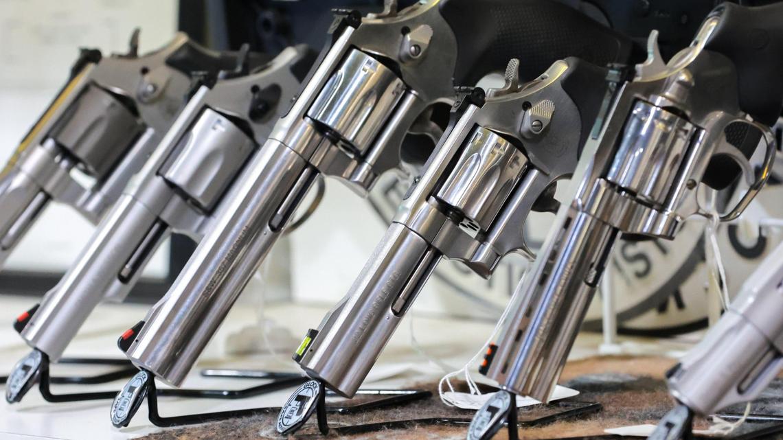 Firearms are displayed during a press conference at Top Gun Indoor Range at 12015 SW. 114 PL in Miami, Florida, Friday, July 18, 2025. The Bureau of Alcohol, Tobacco, Firearms and Explosives Miami Field Division announced a campaign to bring awareness of the consequences of illegally purchasing a firearm for another individual who cannot purchase a firearm themselves.