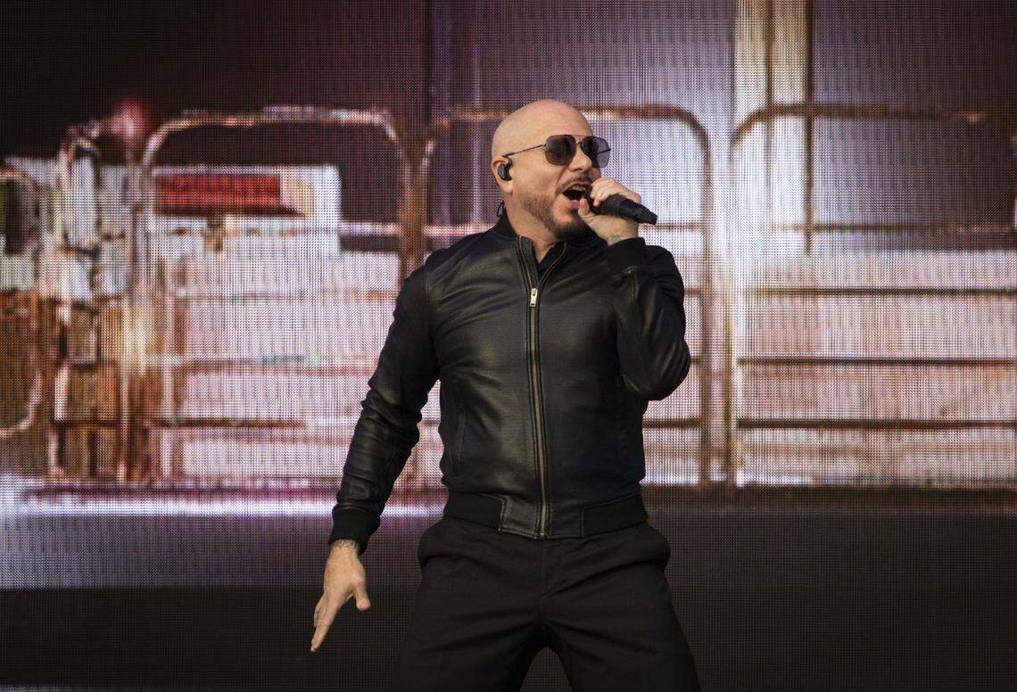Pitbull performs at the Allstate Championship Tailgate at the stadium before the College Football Playoff National Championship Game at Hard Rock Stadium on Monday, Jan. 19, 2026 in Miami Gardens, Fla.