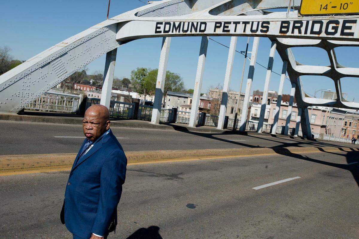 Congressman John Lewis stands on the Edmund Pettus Bridge on Sunday, March 4, 2018, in Selma, Ala., during the Faith and Civil Rights Institute Congressional Civil Rights Pilgrimage to commemorate the 53rd anniversary Of Bloody Sunday. Lewis, then 25, was one of the leaders of the march and was clubbed in the head by a law enforcement officer during the March 7, 1965, march.