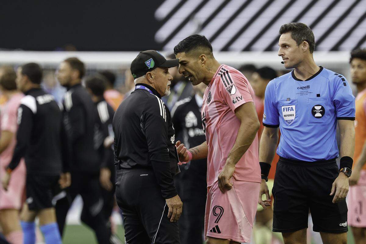 SEATTLE, WASHINGTON - AUGUST 31: Head of security Gene Ramirez of the Seattle Sounders and Luis Suárez #9 of Inter Miami CF interact after the Leagues Cup Final match between Seattle Sounders and Inter Miami CF at Lumen Field on August 31, 2025 in Seattle, Washington. The Seattle Sounders won 3-0.