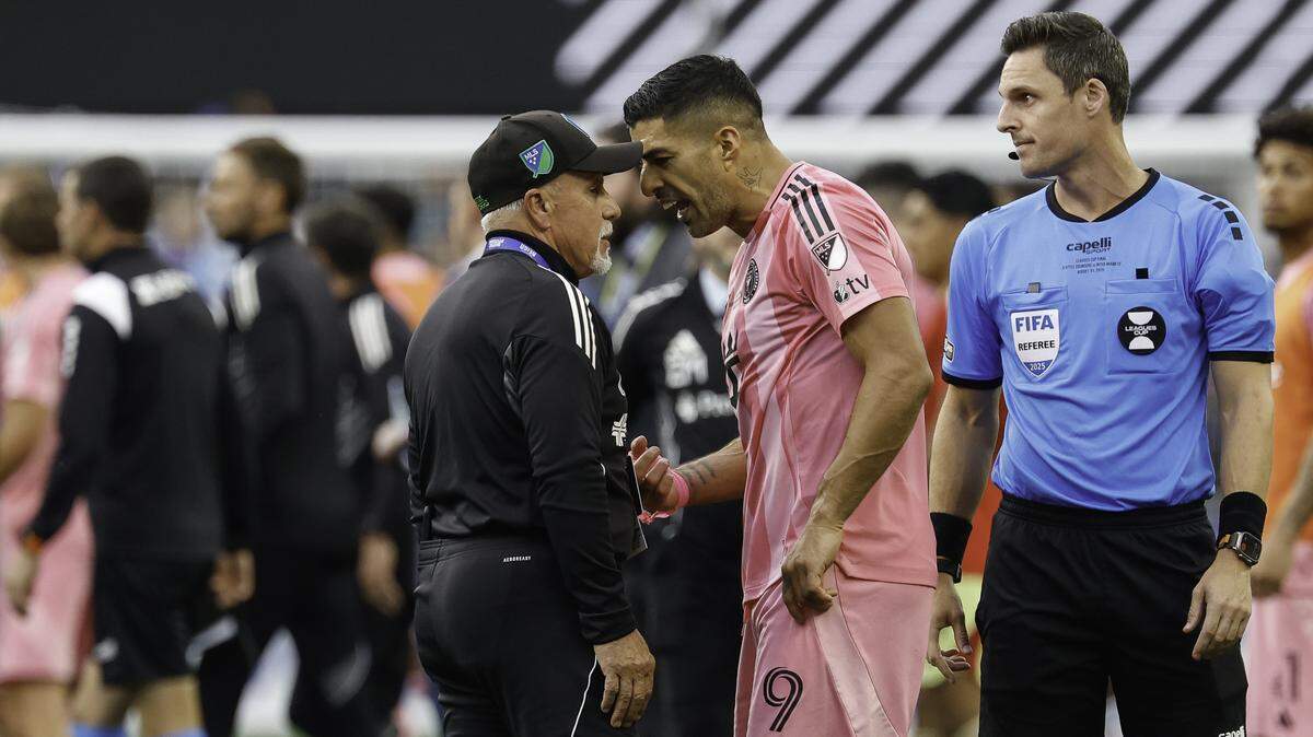 SEATTLE, WASHINGTON - AUGUST 31: Head of security Gene Ramirez of the Seattle Sounders and Luis Suárez #9 of Inter Miami CF interact after the Leagues Cup Final match between Seattle Sounders and Inter Miami CF at Lumen Field on August 31, 2025 in Seattle, Washington. The Seattle Sounders won 3-0.