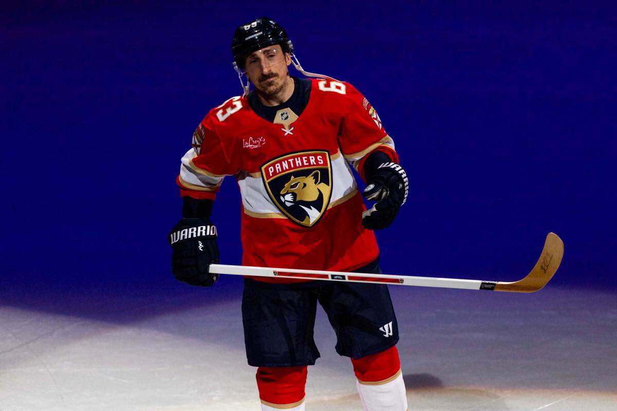 Florida Panthers center Brad Marchand (63) reacts two bet named the first star of the game against the Detroit Red Wings during the third period of an NHL game at Amerant Bank Arena on Thursday, April 10, 2025, in Sunrise, Fla.