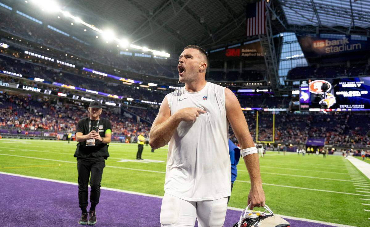 Kansas City Chiefs tight end Travis Kelce points to his heart following the Chiefs’ 27-20 win over the Minnesota Vikings in an NFL football game on Sunday, Oct. 8, 2023, at U.S. Bank Stadium in Minneapolis, Minn.