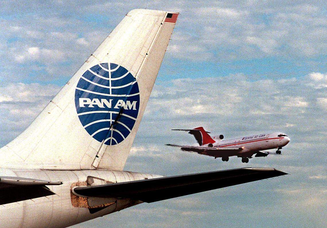 A Carnival Air Lines plane lands at Miami International Airport. PanAm bought out Carnival in 1997.