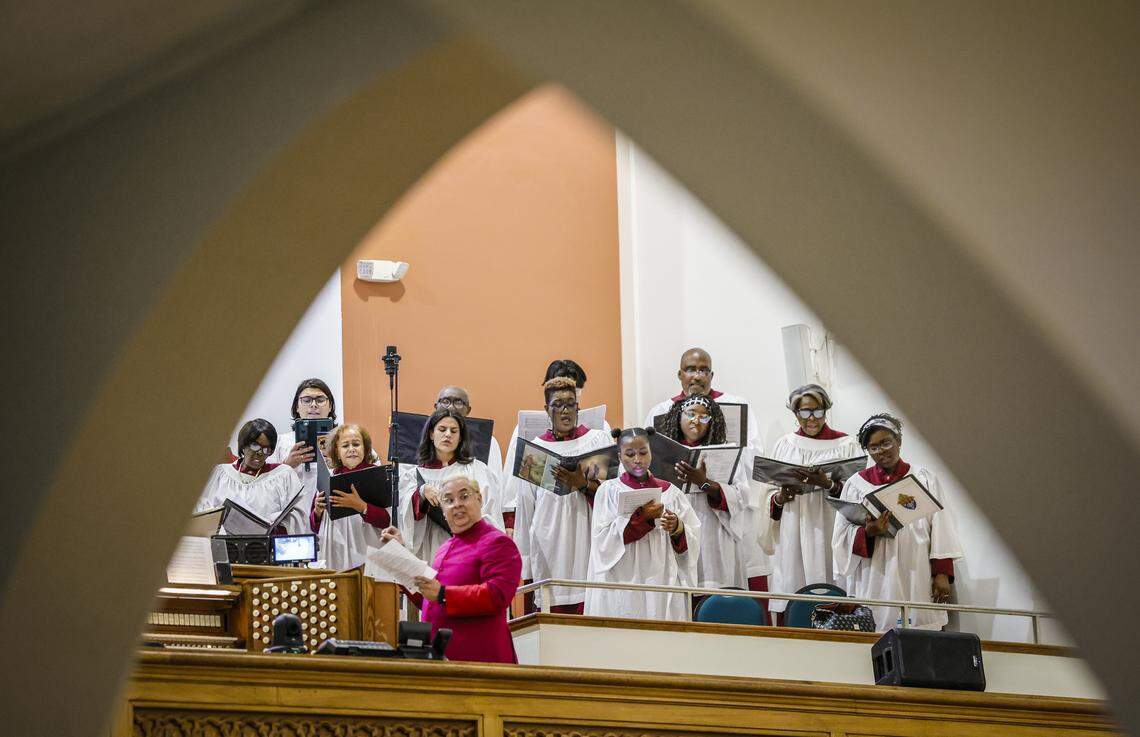 The church choir performs as Archbishop Thomas Wenski presides over Good Friday of the Lord’s Passion at St. Mary Cathedral on Friday, April 3, 2026, in Miami.