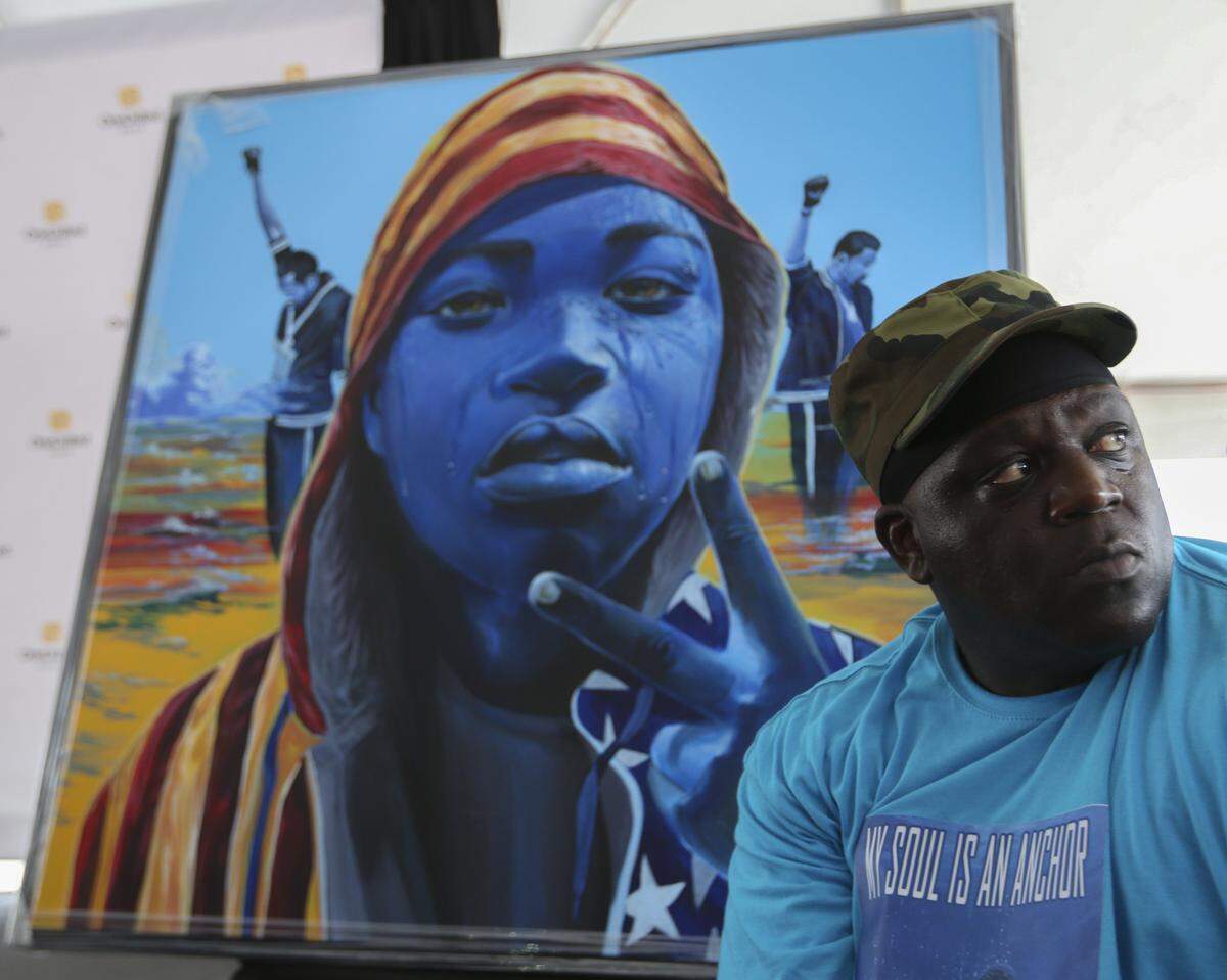 Artist Addonis Parker, whose murals adorn buildings throughout South Florida, says King’s way of shining a light on the downtrodden is what he tries to do with his art.