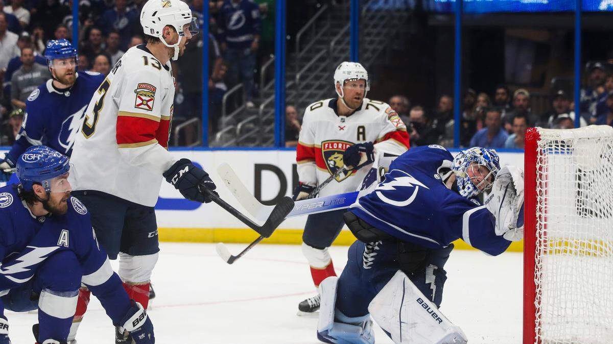 Tampa Bay Lightning goaltender Andrei Vasilevskiy (88) makes a save with Florida Panthers right wing Patric Hornqvist (70) in front with the Panthers on the power play during second period action of Game Three of the second round of the Stanley Cup Playoffs at Amalie Arena on Sunday, May 22, 2022 in Tampa, Florida. (Dirk Shadd/Tampa Bay Times/TNS)