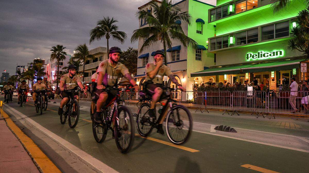 Miami-Dade Police bike patrol make their way down Ocean Drive during spring break in Miami Beach, on Sunday March 10, 2024.