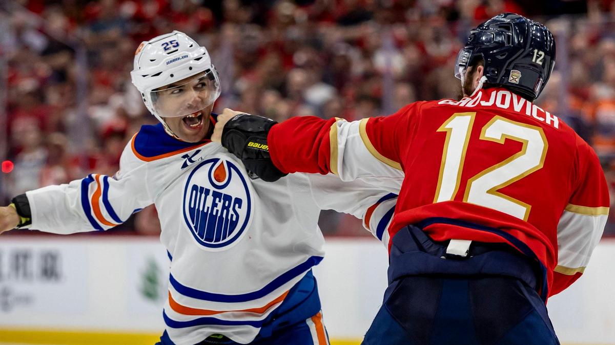 Edmonton Oilers defenseman Darnell Nurse (25) left fights with Florida Panthers left wing Jonah Gadjovich (12) during the third period of Game 3 in the NHL Stanley Cup Final series at Amerant Bank Arena on Monday, June 9, 2025, in Sunrise, Fla.