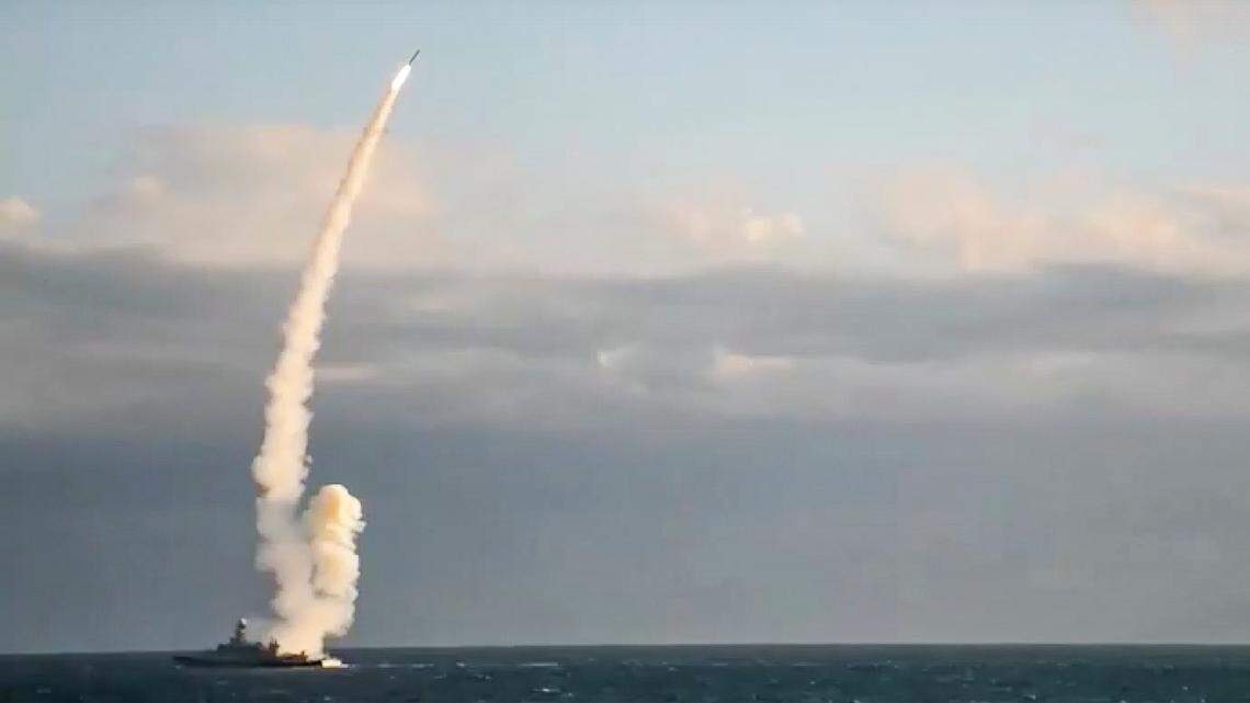 In this handout photo released by Russian Defense Ministry Press Service on Monday, Oct. 31, 2022, a Russian warship launches a cruise missile at a target in Ukraine.