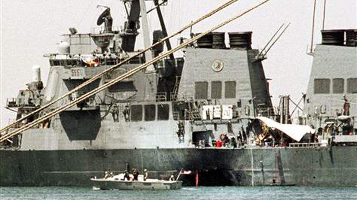 In October 2000, a small boat guarded the USS Cole in Aden, Yemen, after another small boat, with explosives, floated up to the warship.