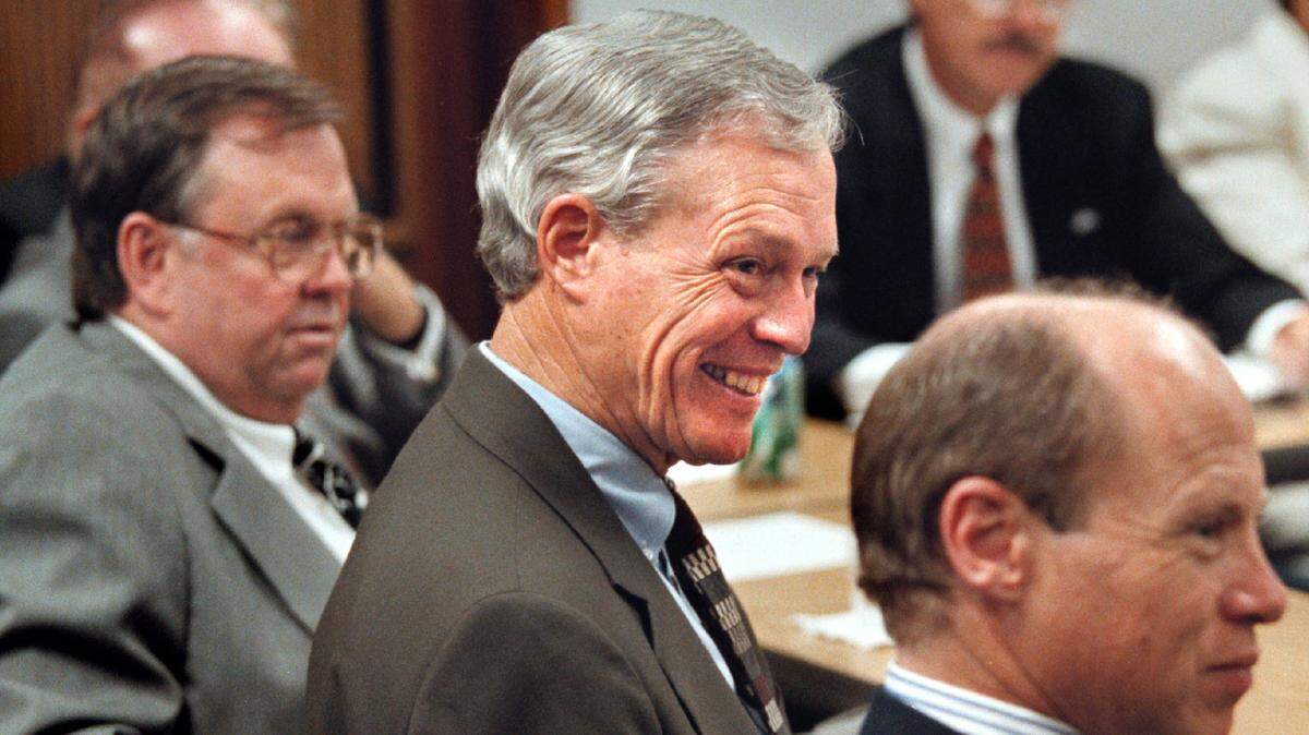 In this photo from June 1996, then-Florida Lt. Gov. Buddy MacKay (center) smiles during a roundtable discussion at Memorial Regional Hospital in Hollywood with civic leaders to discuss mental health care delivery systems. At his left is John Primeau, chairman of the board of commissioners of the South Broward Hospital District, and at his right, Sen. Ken Jenne.