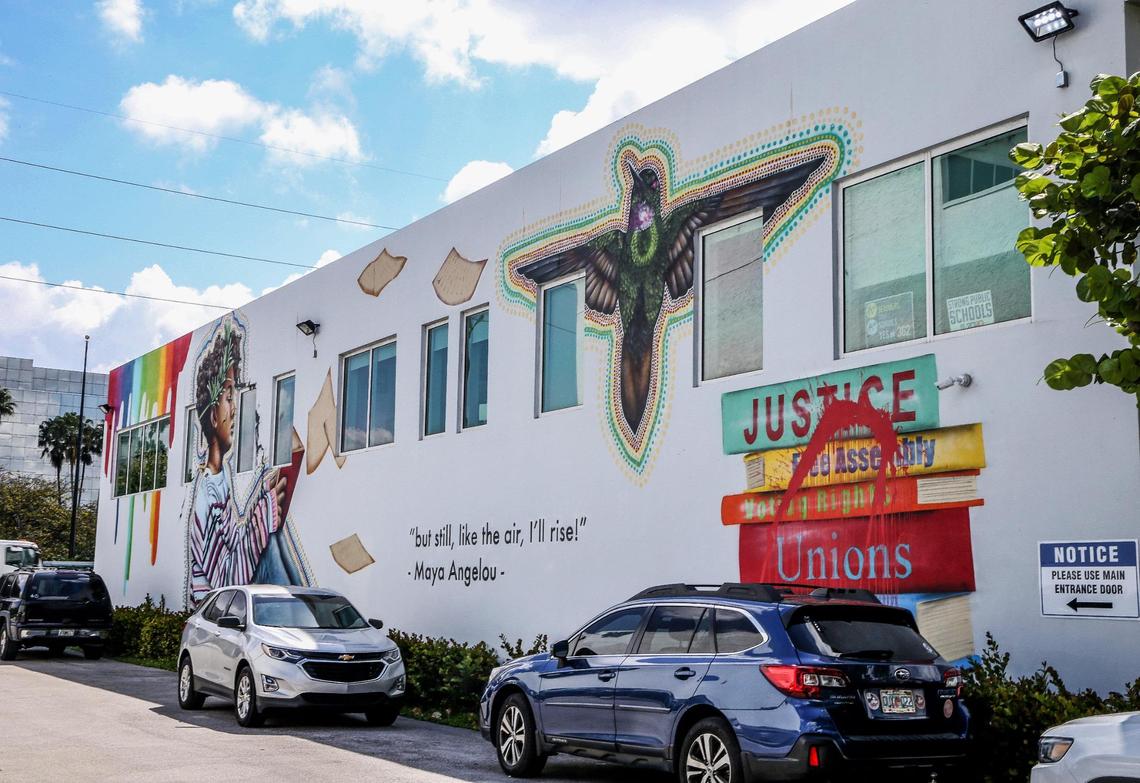 The Miami Springs City Council held a special meeting Wednesday night, March 30, 2022, to vote on whether to ask the United Teachers of Dade, the union for MIami-Dade public school teachers, to remove a mural painted on the union’s headquarters at 5553 NW 36th St. The city contends the mural did not follow the city’s approved color palette, which stipulates that no more than three approved colors can be used to paint a building. The union maintains the mural improves a largely neglected part of the city.