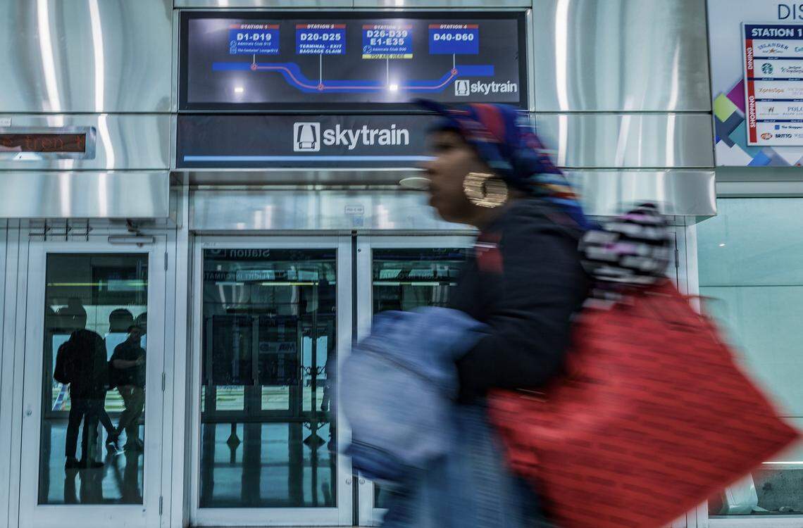 Passengers wait for the MIA Skytrain at station 3, as the Skytrain system service is fully restored ahead of Labor Day weekend in Miami, on Thursday, August 28, 2025.