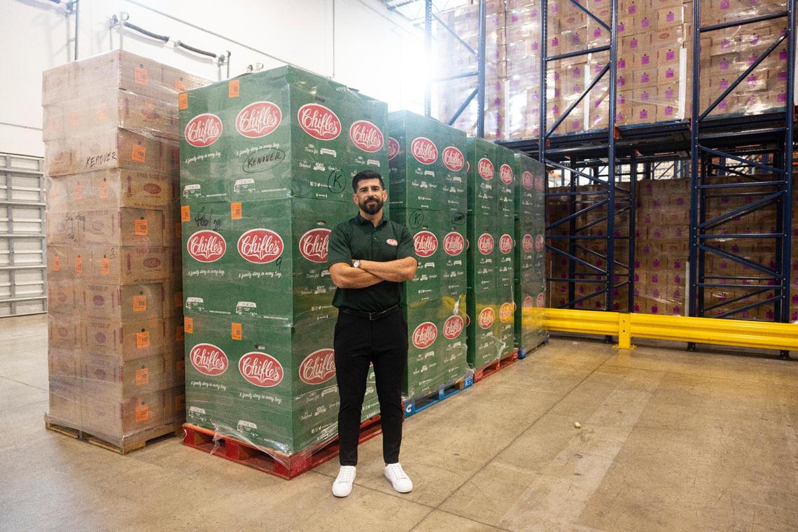 Tony Rivas, CEO of Chifles, stands inside the plantain chips warehouse area near North Miami.