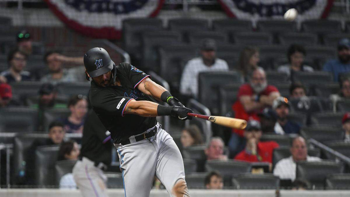 Miami Marlins’ Jorge Alfaro hits a two-run home run during the ninth inning of the team’s baseball game against the Atlanta Braves, Saturday, April 6, 2019, in Atlanta. (AP Photo/John Amis)