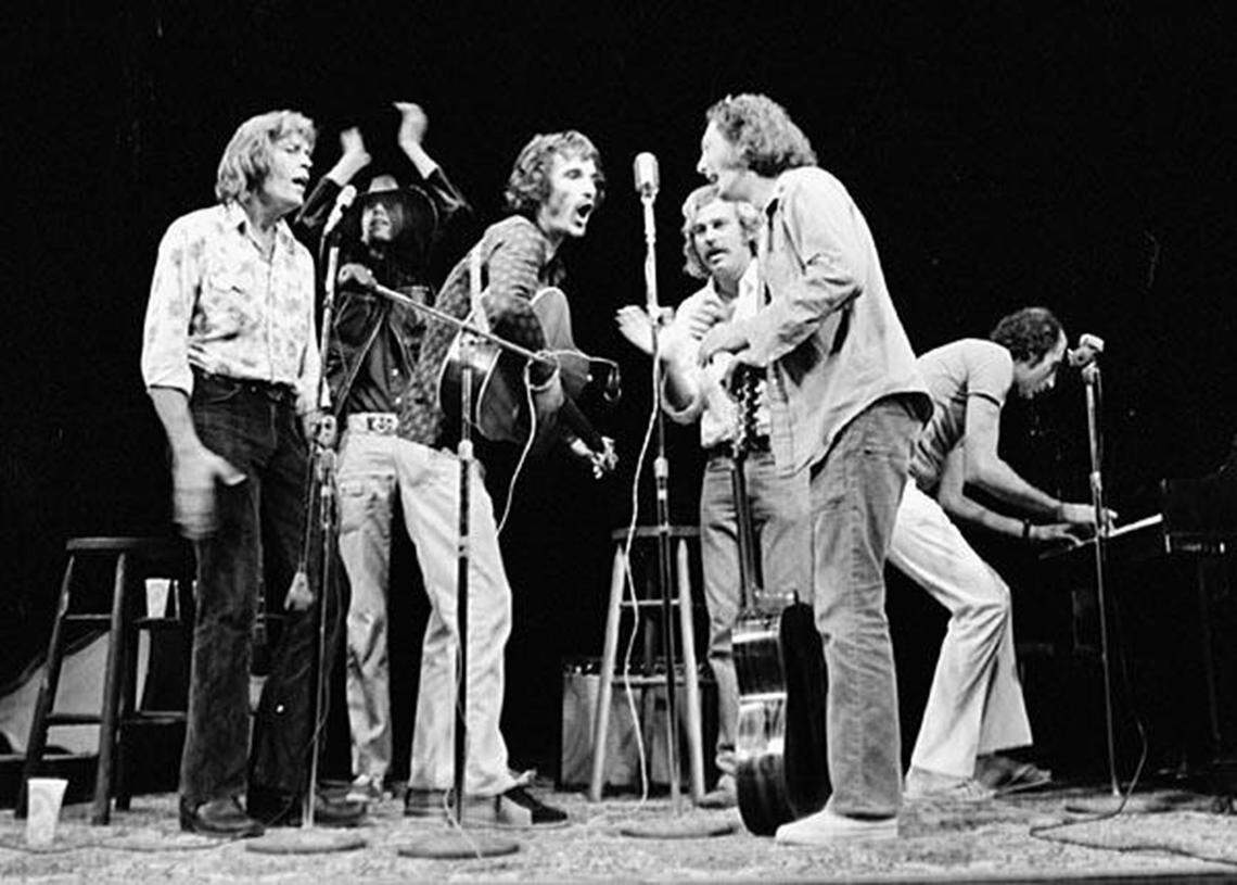 Musicians Bobby Ingram, Rick Danko, Jimmy Buffett, Freddy Neil and Vince Martin performing at the Coconut Grove Playhouse in 1976.