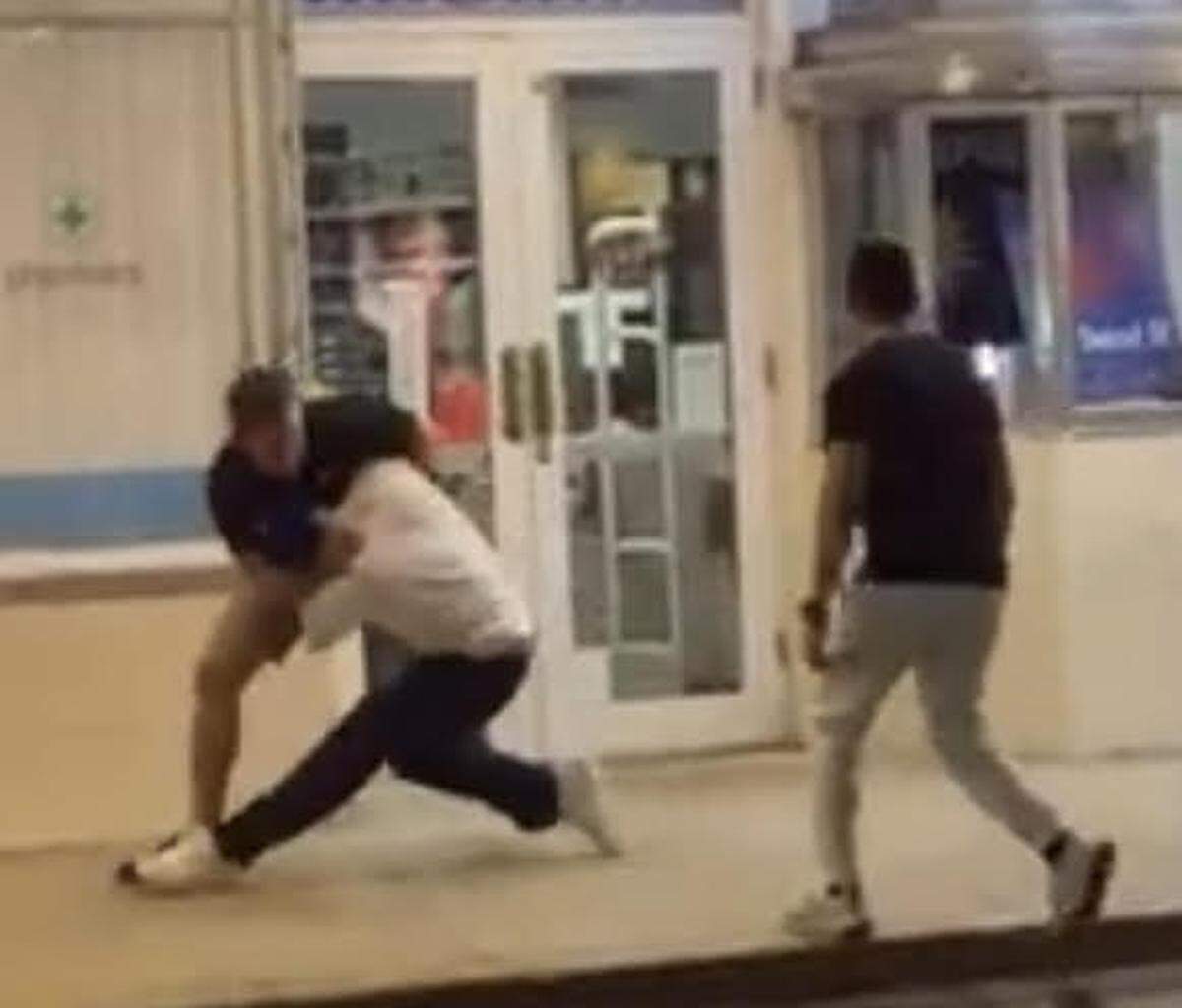 A still frame from a video taken by witnesses shows an off-duty Monroe County Sheriff’s Office deputy fighting with a United States Navy sailor Saturday, Dec. 18, 2021, on Duval Street in Key West.