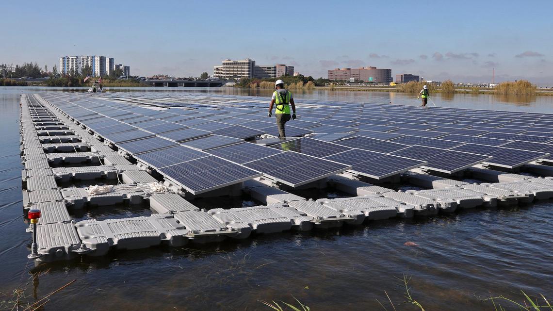 Solar array floats out as FPL and Miami-Dade County launched a half-acre 402-panel floating solar array generating 160 kilowatts of power into the Blue Lagoon adjacent to Miami International Airport on Jan. 28, 2020.