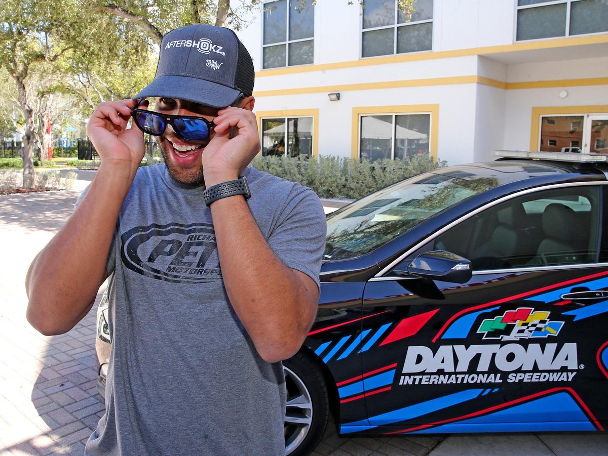 NASCAR driver Bubba Wallace outside the Lyric Theater in Miami, Florida, Feb. 8, 2019. Wallace toured the theater and Overtown before competing in the upcoming Daytona 500.